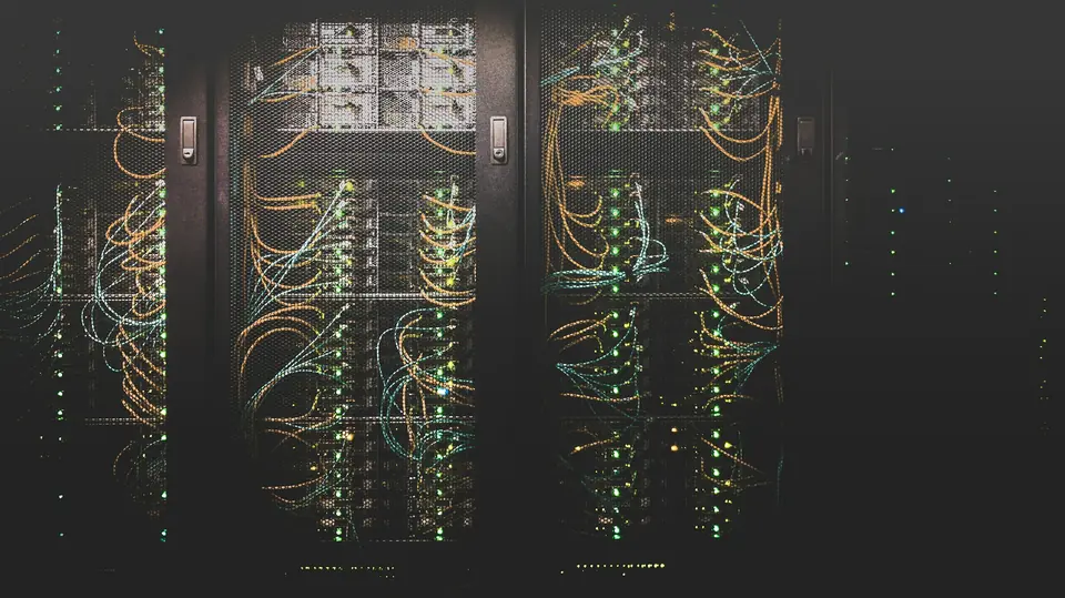 Server racks with network cabling in a data center
